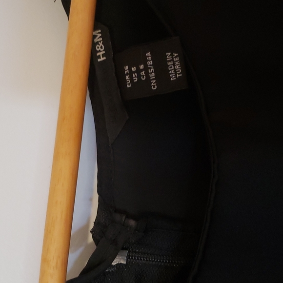 Black h&m shorts jumpsuit. Size 6 - Picture 2 of 3